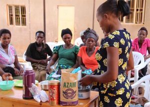 Pastor Pauline teaching women how to bake in Uganda