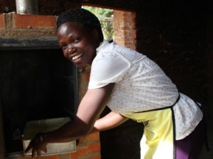 Woman baking in Uganda