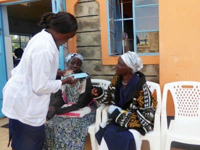 Women check into a free medical clinic in Kenya