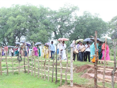 Indian people walking to the opening of a new church