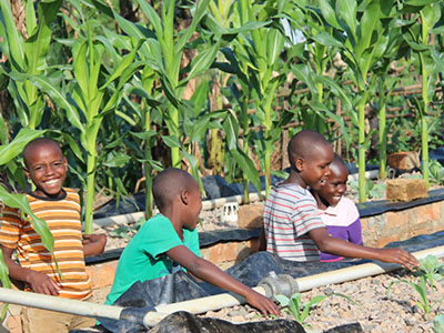 Boys in Uganda celebrate International Youth Day