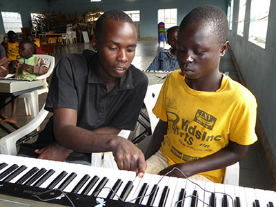 Making music with other people can transform a shy, scared child into an engaged, laughing participant.