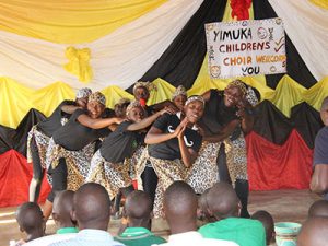 Yimuka Children's Choir preforming during church at Baka Kinship