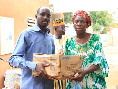 Widow Sankara receives emergency food supplies in Burkina Faso.