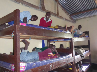 After: The kids are ecstatic over their brand new mattresses.