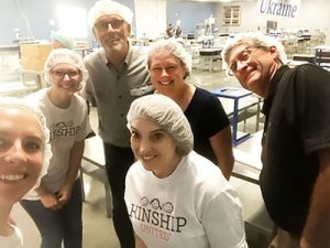 Kinship team members at a FMSC packing event