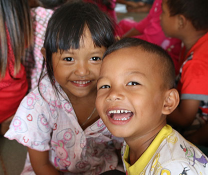 Two children smiling