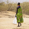 A woman walking in the desert