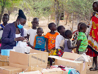 Medicines being organized while children wait for treatment