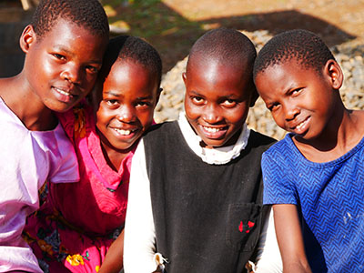 A group of girls smiling in Kenya
