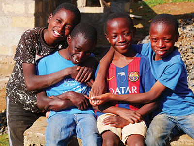 A group of smiling boys in Kenya