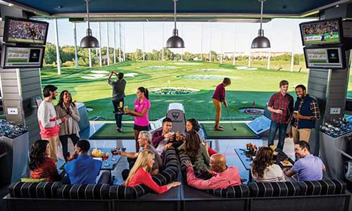 People having fun at Topgolf
