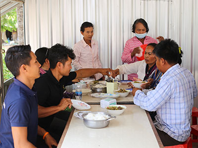 Pastors share a meal during the conference