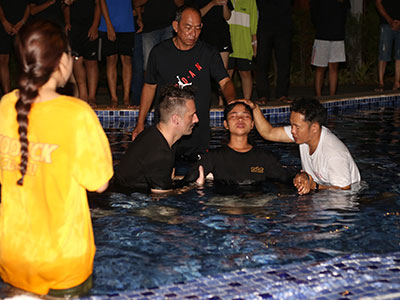 Pastor Jack performing a baptism