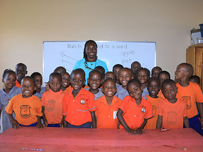 Students in Uganda smiling