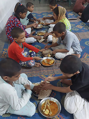 Children eating together as a family
