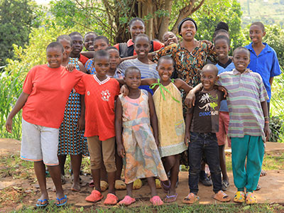 Kyengera Kinship family smiling together