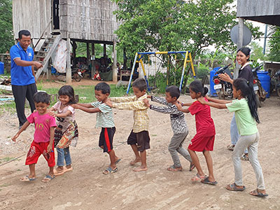 Children in Cambodia playing a fun game