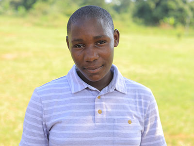 A somber girl from Uganda