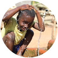 A child enjoying clean water over their head