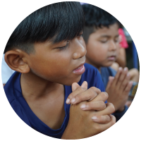 Two children praying