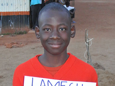 Lameck as a young boy in his Kinship Home