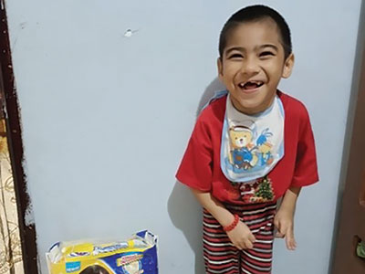 A smiling young boy