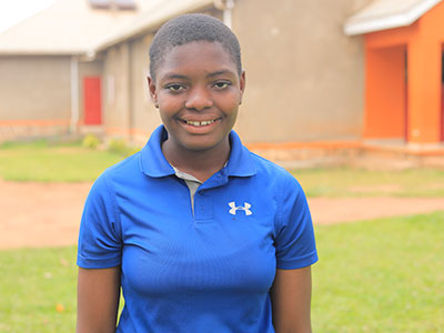 A smiling young woman in Uganda
