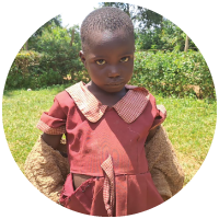 A young child in Kenya in need of new clothes