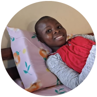 A child in Kenya with her new pillow