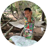A solemn young boy in Thailand