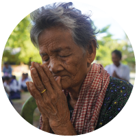 A woman praying in Cambodia