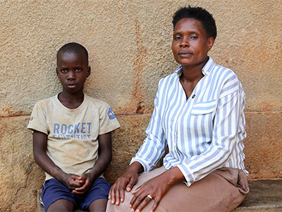 A caregiver sitting with a child