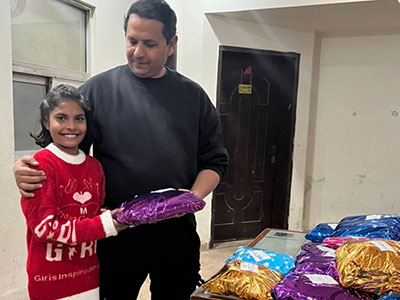 Jennifer smiling alongside ministry leader