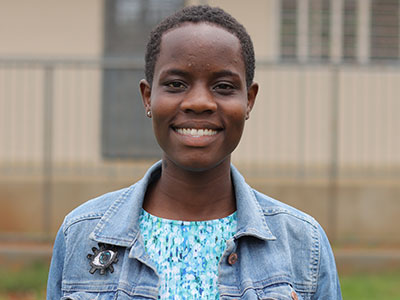 A smiling young woman in Uganda
