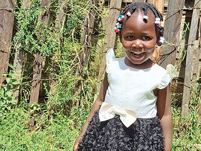 A smiling toddler in Kenya