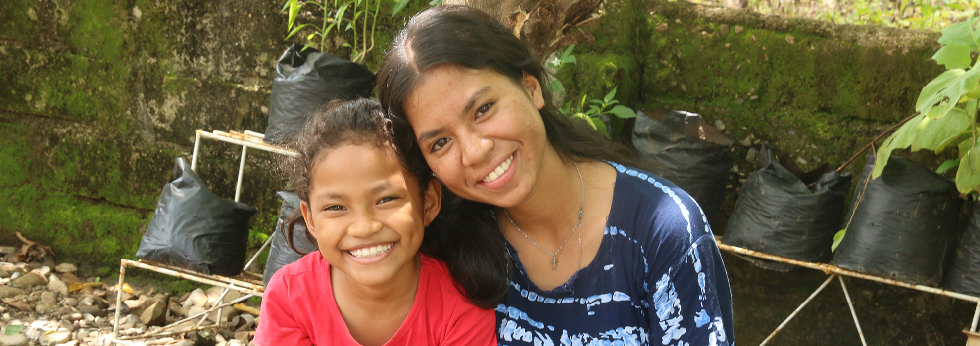 Two smiling girls in Indonesia Two smiling girls in Indonesia