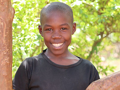 A smiling boy in Uganda